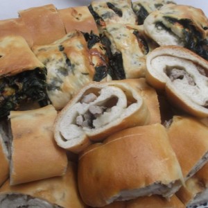 Spinach and Sausage Stuffed bread rolls platter Spinach and Sausage Stuffed bread rolls platter